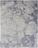 3' X 5' Ivory and Blue Abstract Power Loom Worn Faded Area Rug