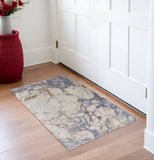 3' X 5' Tan Blue And Beige Abstract Distressed Area Rug