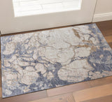3' X 5' Tan Blue And Beige Abstract Distressed Area Rug