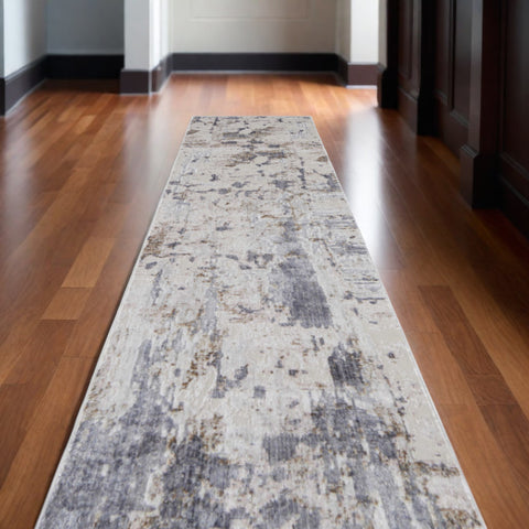 12' Ivory Gray and Blue Abstract Power Loom Worn Faded Runner Rug