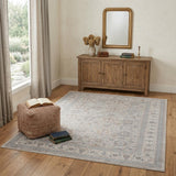 4' X 5' Silver Taupe and Blue Oriental Power Loom Worn Faded Area Rug With Fringe