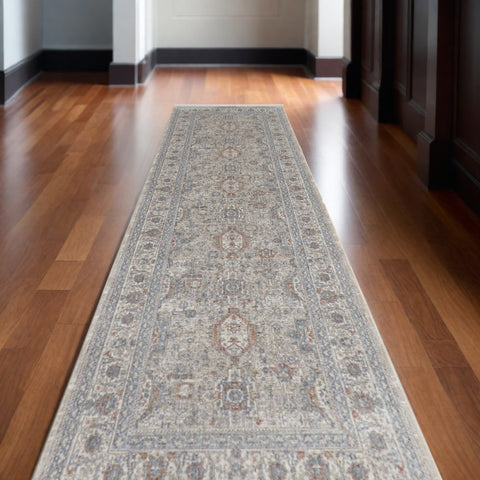 12' Silver Taupe and Blue Oriental Power Loom Worn Faded Runner Rug With Fringe