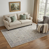 5' X 7' Gray and Ivory Oriental Power Loom Worn Faded Area Rug With Fringe