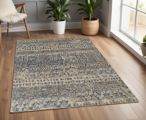 4' X 6' Tan Ivory And Blue Wool Geometric Hand Knotted Area Rug