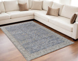 5' X 8' Taupe and Blue Ikat Power Loom Worn Faded Area Rug With Fringe