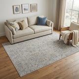5' X 8' Ivory Tan and Blue Abstract Power Loom Worn Faded Area Rug With Fringe