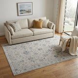 5' X 8' Ivory Taupe and Blue Floral Power Loom Worn Faded Area Rug With Fringe