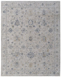5' X 8' Ivory Taupe and Blue Floral Power Loom Worn Faded Area Rug With Fringe