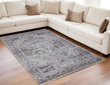 5' X 8' Gray and Ivory Oriental Power Loom Worn Faded Washable Area Rug