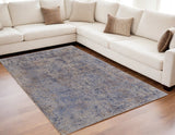 5' X 8' Blue Brown and Tan Abstract Power Loom Area Rug