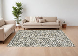 6' X 9' Black Gray And White Faux Cowhide Geometric Area Rug