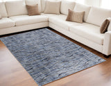 5' X 8' Blue Ivory and Tan Abstract Power Loom Area Rug
