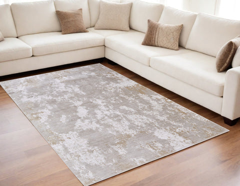 5' X 8' Gray Brown and Ivory Abstract Power Loom Area Rug