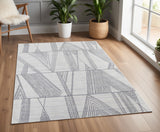 4' X 6' Black and Ivory Abstract Hand Woven Area Rug