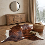4' X 5' Brown and White Cowhide Animal Print Power Loom Area Rug