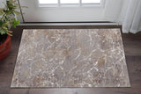 2' X 3' Taupe Brown and Ivory Abstract Power Loom Area Rug