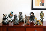 Set of Eight Brown White And Black Resin Panda, Bird, Bear, Monkey, Penguin, Elephant, Tiger, Owl Tabletop Sculpture