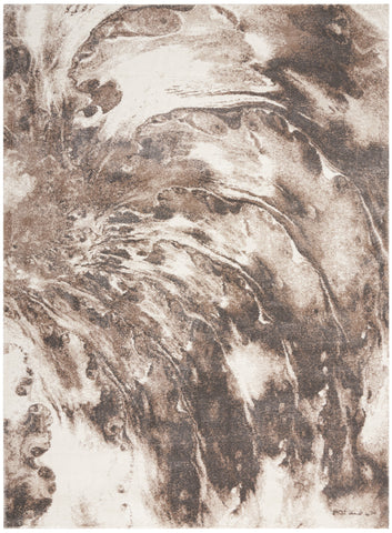 5' X 7' Tan Abstract Power Loom Area Rug