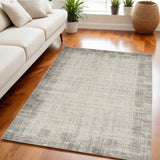 5' X 7' Ivory and Gray Abstract Area Rug