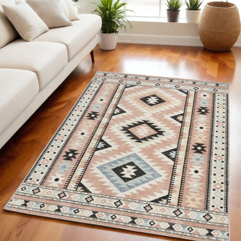 5' X 7' Ivory Pink And Black Geometric Flatweave Area Rug