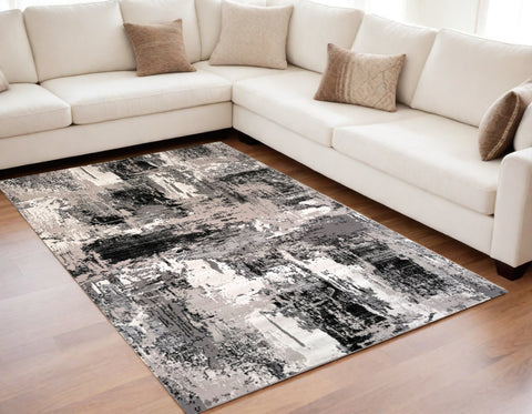 5' X 8' Black Gray and Beige Abstract Area Rug