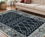 5' X 8' Charcoal And Ivory Wool Southwestern Hand Hooked Area Rug