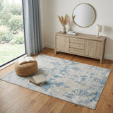 4' X 6' Ivory And Sky Blue Abstract Area Rug