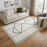 5' X 7' Ivory And Black Geometric Area Rug