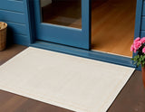 2' X 4' Ivory And Gold Indoor Outdoor Area Rug