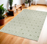 4' X 6' Green Geometric Area Rug