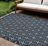 6' X 9' Navy Blue And Ivory Geometric Indoor Outdoor Area Rug