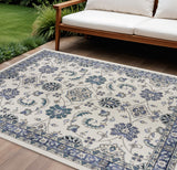 7' X 10' Ivory And Blue Floral Indoor Outdoor Area Rug