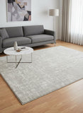5' X 7' Ivory Abstract Shag Power Loom Area Rug