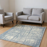 7' X 10' Ivory Abstract Power Loom Area Rug