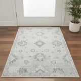 3' X 5' Ivory Floral Power Loom Worn Faded Area Rug