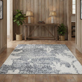 4' X 6' Blue Floral Power Loom Worn Faded Area Rug