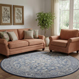 8' Blue Floral Power Loom Worn Faded Round Rug