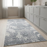 8' Blue Floral Power Loom Worn Faded Runner Rug