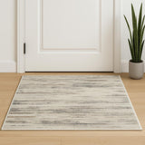 2' X 4' Beige Ivory And Brown Abstract Distressed Area Rug