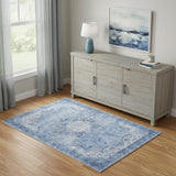 4' X 6' Blue And Ivory Floral Distressed Area Rug