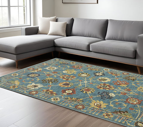 7' X 10' Blue Yellow And Ivory Oriental Area Rug With Fringe