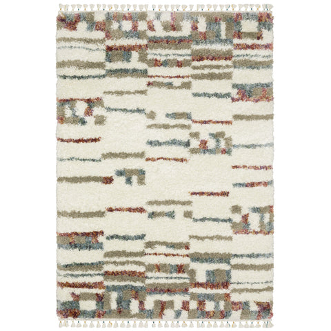 4' X 5' Tan Gray And Ivory Abstract Shag Distressed Area Rug With Fringe