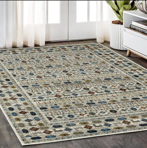 5' X 7' Ivory Tan And Gray Tribal Area Rug