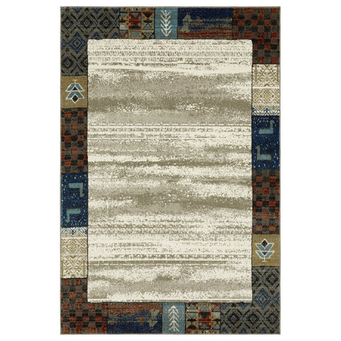 4' X 6' Ivory Tan And Blue Patchwork Area Rug