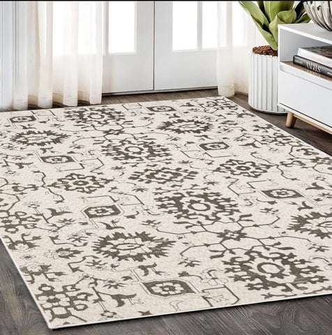 5' X 8' Ivory And Gray Oriental Area Rug