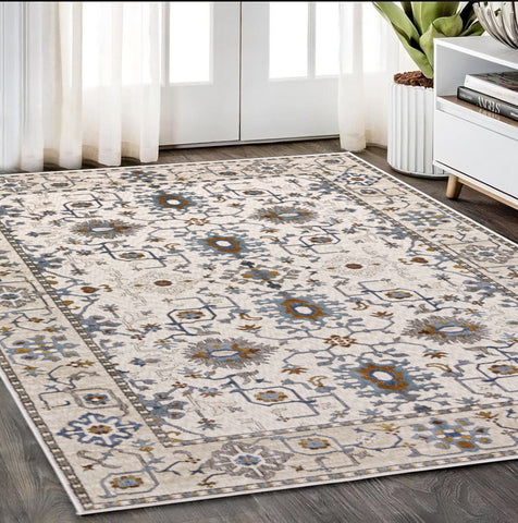 5' X 8' Ivory Burnt Orange And Blue Oriental Area Rug