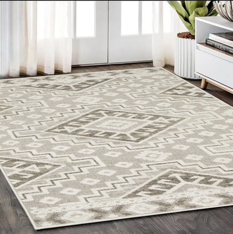 5' X 8' Beige And Brown Tribal Area Rug