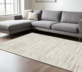 7' X 10' Ivory And Brown Striped Distressed Area Rug
