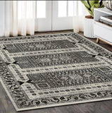 5' X 8' Ivory And Charcoal Oriental Area Rug With Fringe
