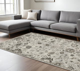 7' X 10' Ivory And Gray Oriental Area Rug With Fringe